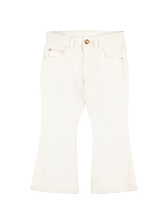 Versace: Pantalones de denim de algodón - Blanco - kids-girls_0 | Luisa Via Roma