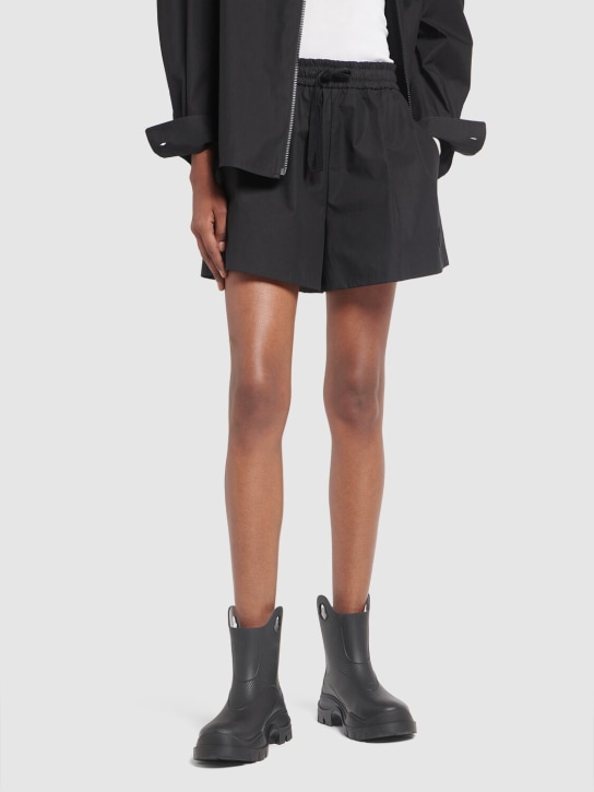 Moncler: 32mm Misty rubber rain boots - Black - women_1 | Luisa Via Roma