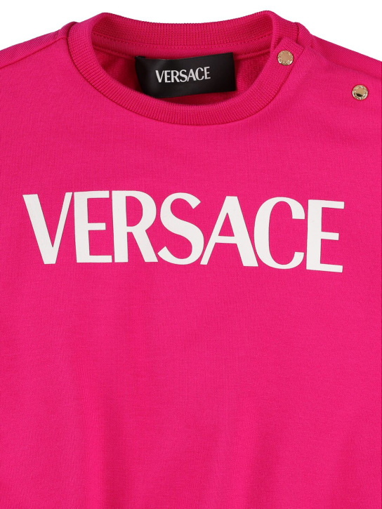 Versace: Sweat-shirt en coton imprimé à col rond - Fuchsia/Blanc - kids-girls_1 | Luisa Via Roma