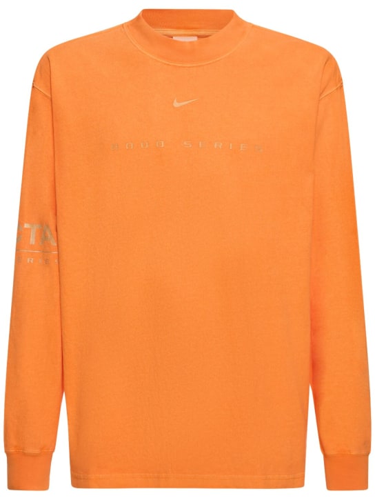 Nike: T-shirt Nocta in cotone stampato - Orange Horizon - men_0 | Luisa Via Roma