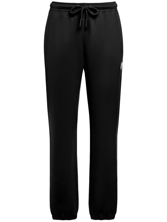 Moncler: Pantalones de felpa de algodón con logo - Negro - women_0 | Luisa Via Roma