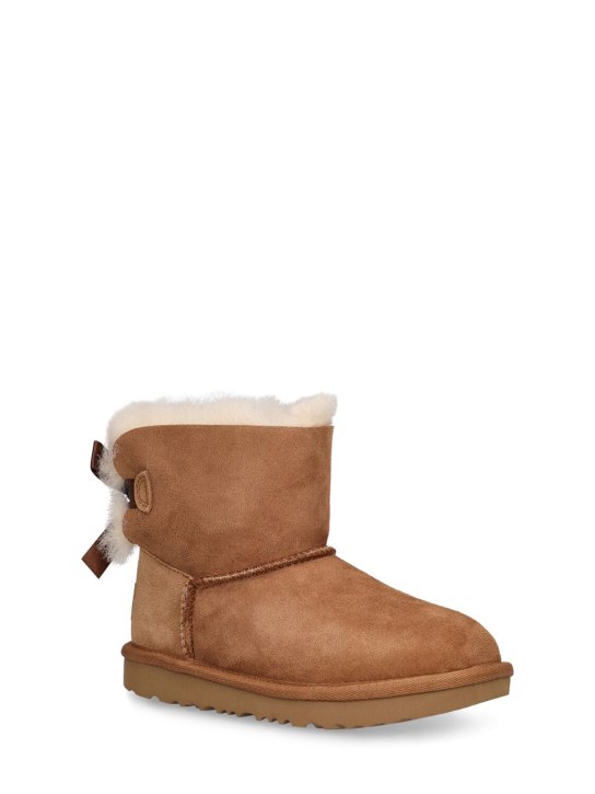 Ugg: Mini Bailey Bow II shearling boots - Braun - kids-girls_1 | Luisa Via Roma