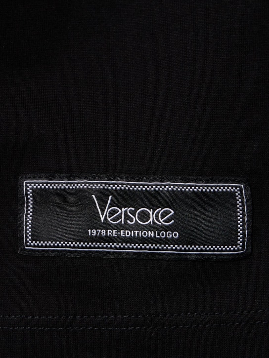 Versace: Logo printed cotton t-shirt - Black - men_3 | Luisa Via Roma