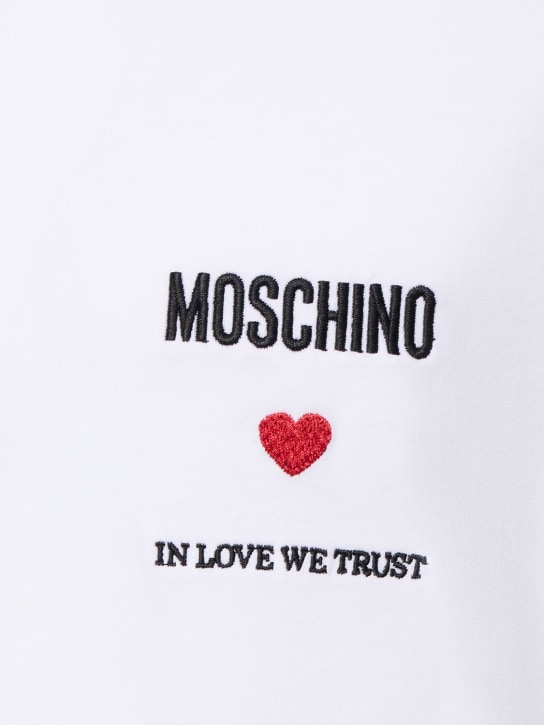 In love we trust cotton jersey t-shirt - Moschino - Men | Luisaviaroma