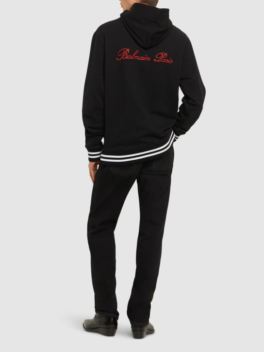 Balmain: Logo signature cotton hoodie - Black - men_1 | Luisa Via Roma