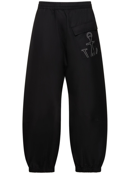 JW Anderson: Pantalones deportivos de nylon - Negro - men_0 | Luisa Via Roma