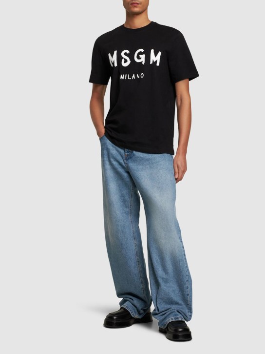MSGM: T-shirt en jersey de coton imprimé logo - Noir/Blanc - men_1 | Luisa Via Roma