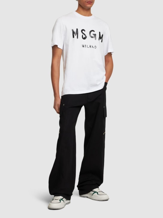 MSGM: Logo print cotton jersey t-shirt - Beyaz/Siyah - men_1 | Luisa Via Roma