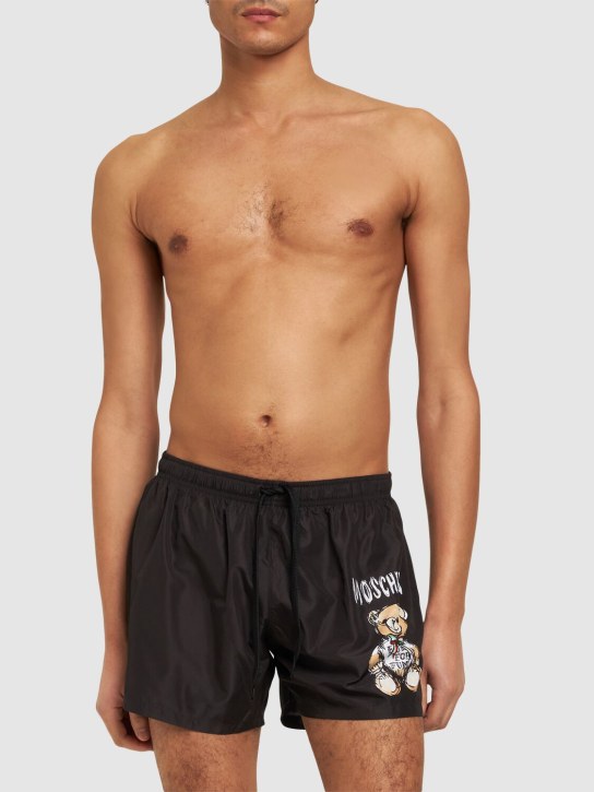Moschino: Teddy print nylon swim shorts - Black - men_1 | Luisa Via Roma