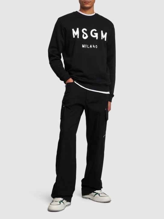 MSGM: Logo print brushed cotton sweatshirt - Black - men_1 | Luisa Via Roma