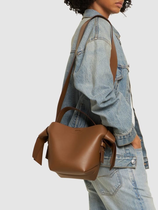 Acne Studios: Mini Musubi leather top handle bag - Camel Brown - women_1 | Luisa Via Roma
