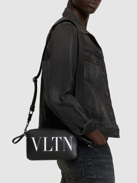 Valentino Garavani: VLTN print crossbody bag - Black/White - men_1 | Luisa Via Roma