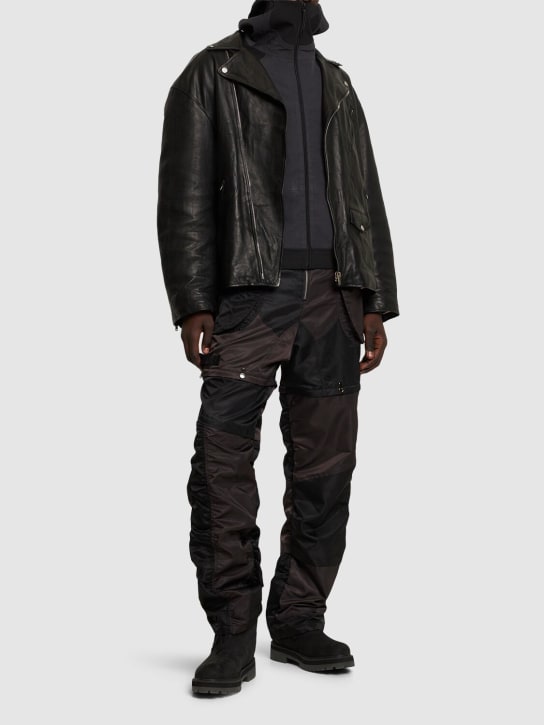 Andersson Bell: Detachable patchwork nylon cargo pants - Siyah - men_1 | Luisa Via Roma