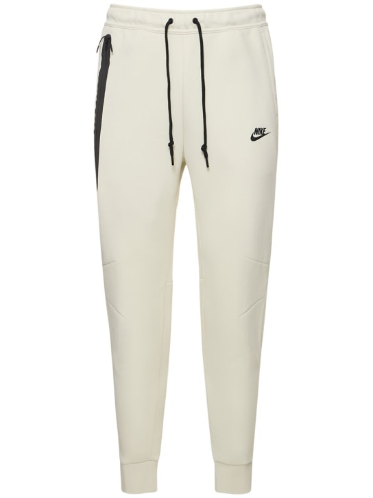 Nike: Pantalon de jogging slim en Tech Fleece - Sea Glass/Black - men_0 | Luisa Via Roma