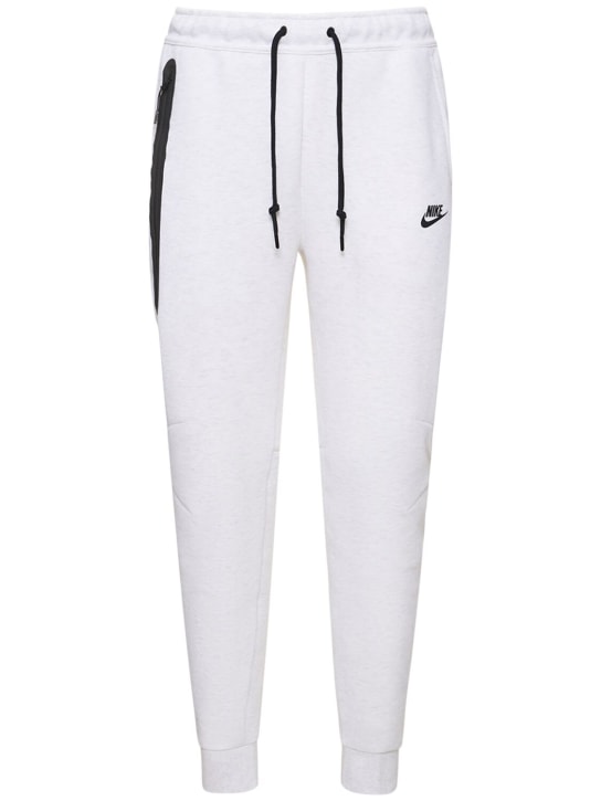 Nike: Pantaloni jogger slim fit Tech Fleece - Birch Heather - men_0 | Luisa Via Roma