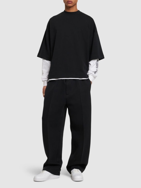 Nike: Pantalon oversize en Tech Fleece - Noir/Noir - men_1 | Luisa Via Roma