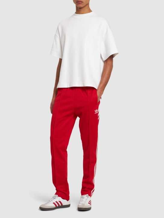adidas Originals: Pantalones deportivos de algodón - Rojo/Blanco - men_1 | Luisa Via Roma