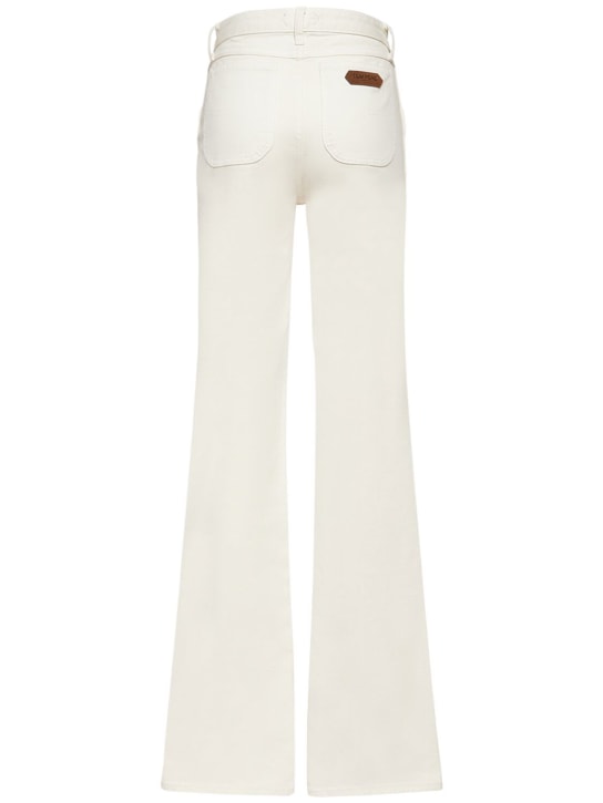 Tom Ford: Jeans cintura alta acampanados de denim stretch - Blanco - women_1 | Luisa Via Roma
