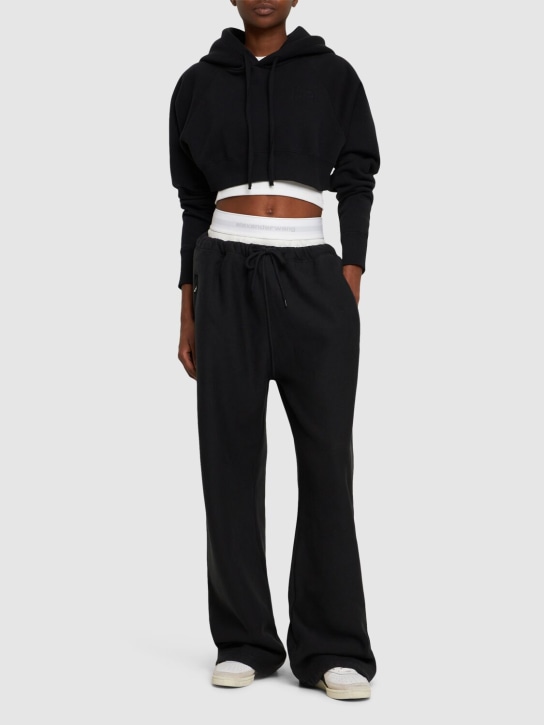 Alexander Wang: Pantalones deportivos anchos de algodón con logo - Negro Lavado - women_1 | Luisa Via Roma