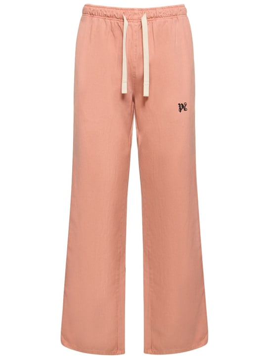 Palm Angels: Monogram cotton travel sweatpants - Pink - men_0 | Luisa Via Roma