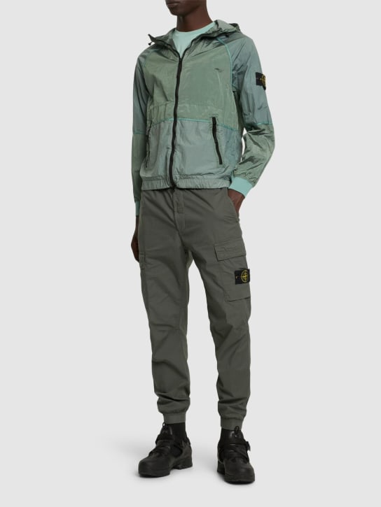 Stone Island: Hooded Econyl nylon jacket - Light Green - men_1 | Luisa Via Roma
