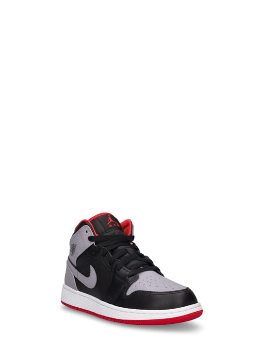 Nike: Sneakers Air Jordan 1 Mid - Black/Cement Grey - kids-boys_1 | Luisa Via Roma