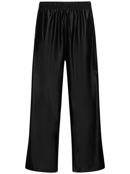 adidas Originals: Oversized tech track pants - men_0 | Luisa Via Roma
