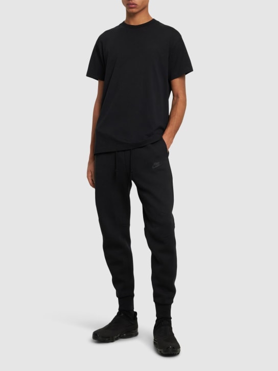 Nike: Tech fleece slim fit sweatpants - Black - men_1 | Luisa Via Roma