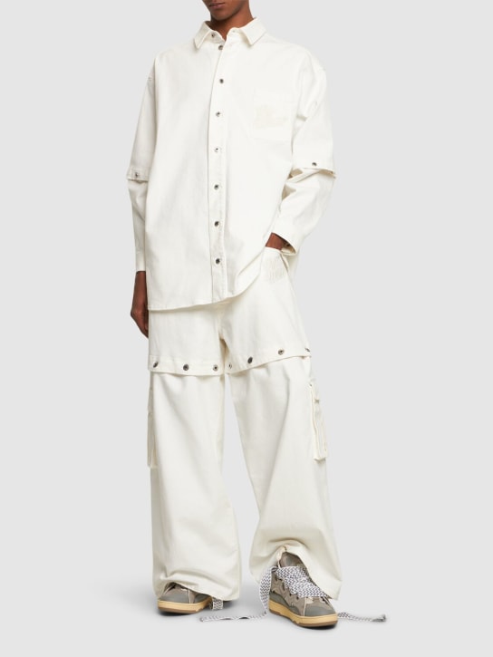 Off-White: Jeans baggy fit in denim di cotone con logo 90s - Bianco Naturale - men_1 | Luisa Via Roma