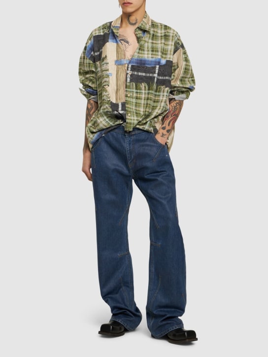 Andersson Bell: Tripot coated cotton flared jeans - Blue - men_1 | Luisa Via Roma