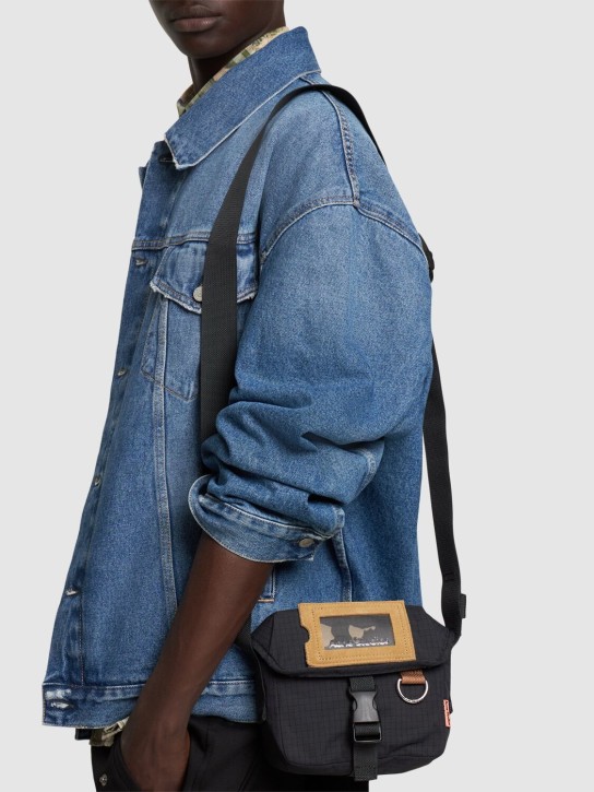 Acne Studios: Mini ripstop nylon messenger bag - Black - men_1 | Luisa Via Roma