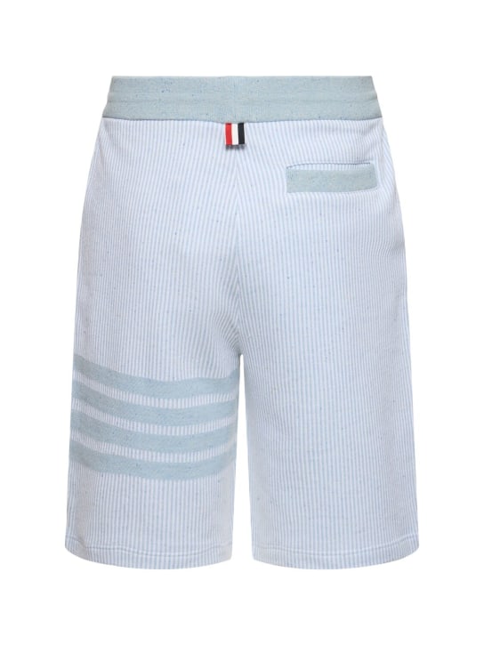 Thom Browne: Cotton & silk sweat shorts w/bars - Light Blue - men_4 | Luisa Via Roma