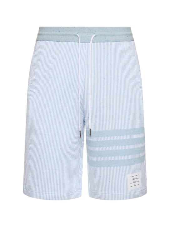 Thom Browne: Cotton & silk sweat shorts w/bars - Light Blue - men_0 | Luisa Via Roma