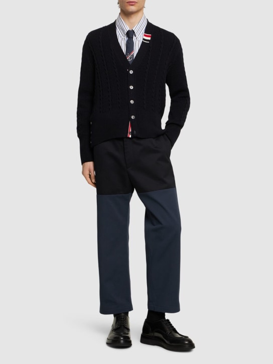 Thom Browne: Cable knit relaxed v neck cardigan - Navy - men_1 | Luisa Via Roma