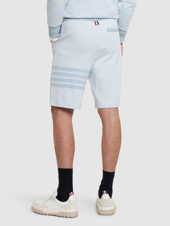 Thom Browne: Cotton & silk sweat shorts w/bars - Light Blue - men_2 | Luisa Via Roma