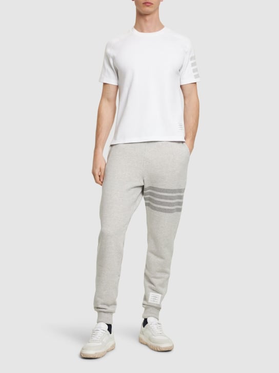 Thom Browne: Cotton ss t-shirt w/ 4 bar stripe - White - men_1 | Luisa Via Roma