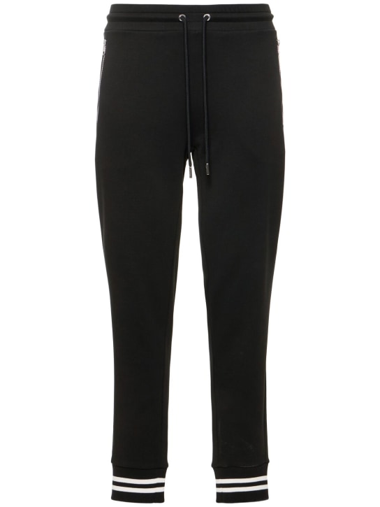 Moncler: Cotton fleece sweatpants - 黑色 - men_0 | Luisa Via Roma