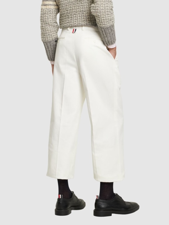 Thom Browne: Low rise cotton belt loop pants - men_2 | Luisa Via Roma
