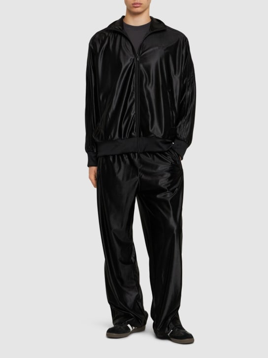 adidas Originals: Oversized tech track pants - men_1 | Luisa Via Roma