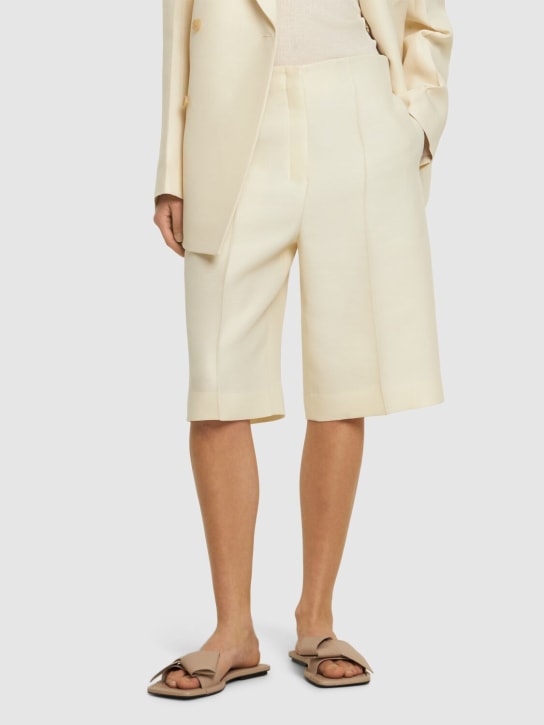 Acne Studios: 05mm Musubi leather slides - women_1 | Luisa Via Roma