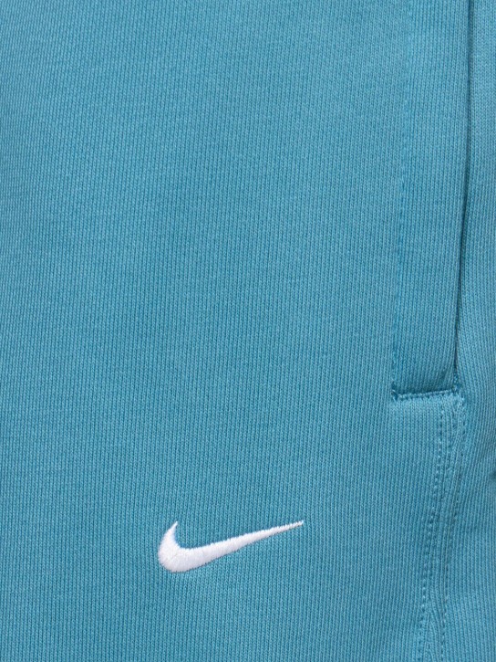 Nike: Solo Swoosh cotton blend pants - Noise Aqua - men_1 | Luisa Via Roma