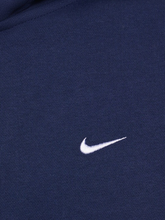 Nike: Sweat zippé en coton mélangé à capuche Solo Swoosh - Bleu Nuit - men_1 | Luisa Via Roma