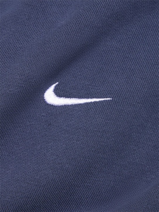 Nike: Sweat zippé en coton mélangé à capuche Solo Swoosh - Thunder Blue - men_1 | Luisa Via Roma