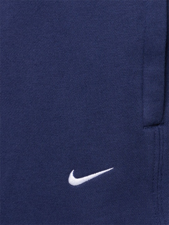 Nike: Solo Swoosh cotton blend pants - Blu Notte - men_1 | Luisa Via Roma