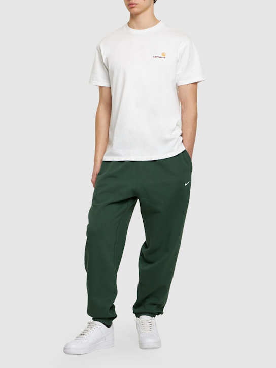 Nike: Trainingshose aus Baumwollmischung „Solo Swoosh“ - men_1 | Luisa Via Roma