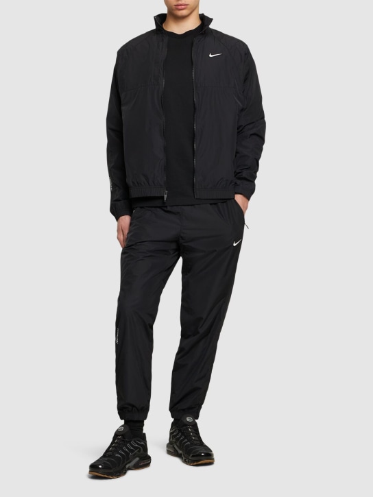 Nike: Gewebte Trainingsjacke „Nocta“ - men_1 | Luisa Via Roma