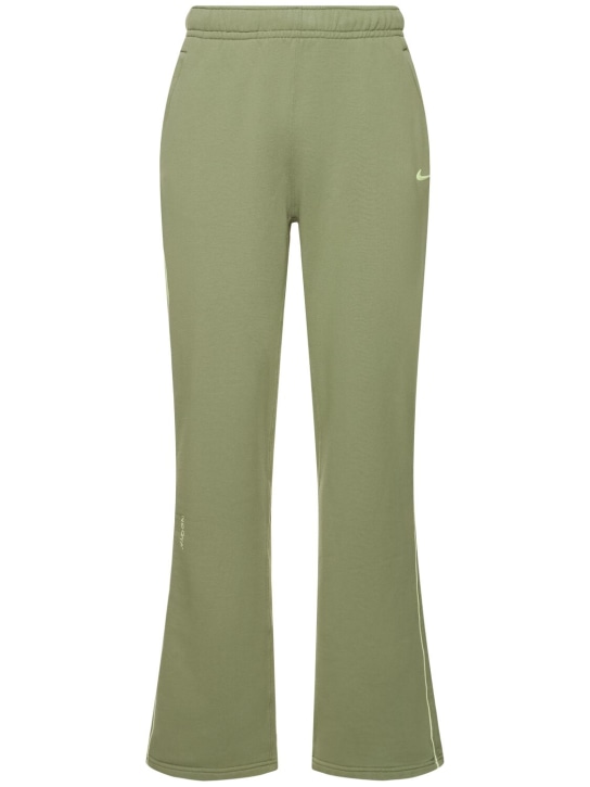 Nike: Pantaloni Nocta in pile - Oil Green/Lime - men_0 | Luisa Via Roma