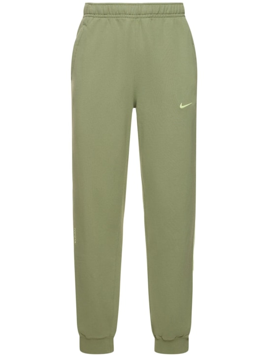 Nike: Pantalones Nocta Fleece - Oli Green/Lime - men_0 | Luisa Via Roma