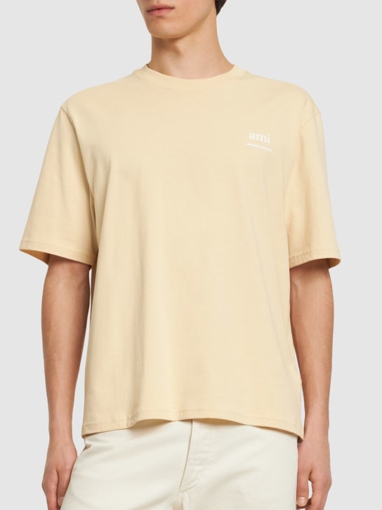 AMI Paris: Logo printed boxy cotton t-shirt - Cream - women_1 | Luisa Via Roma