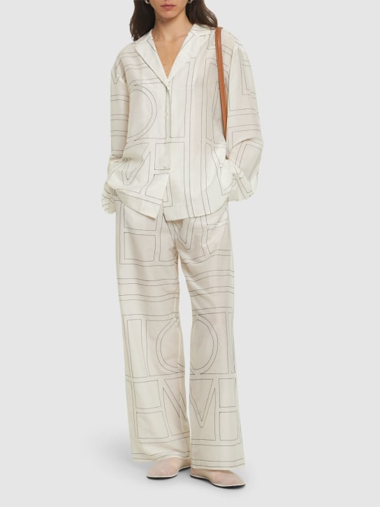 Toteme: Monogram cotton blend pajama pants - Beyaz/Siyah - women_1 | Luisa Via Roma